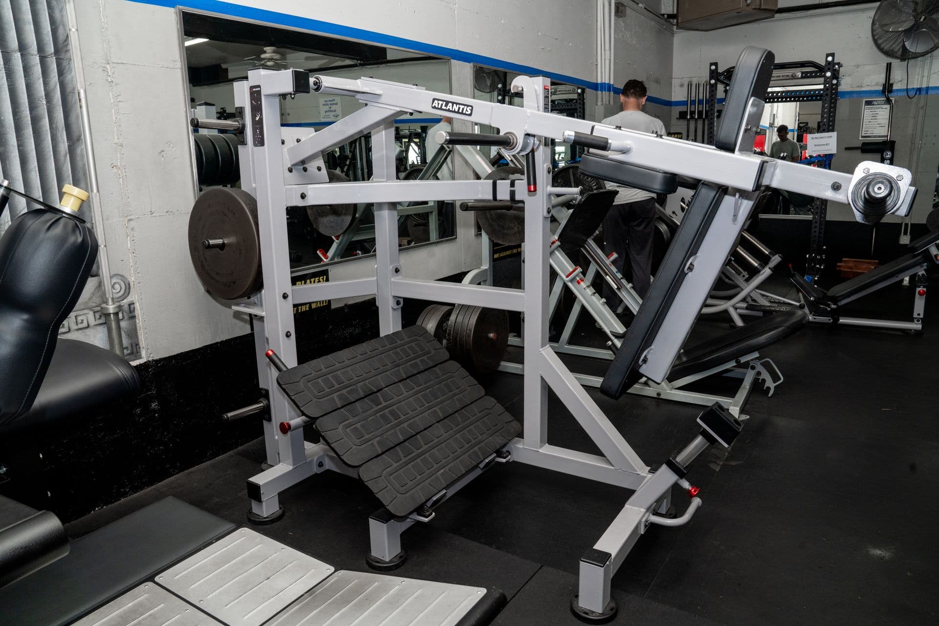 Premium Atlantis squat rack equipment at Iron Works Gym