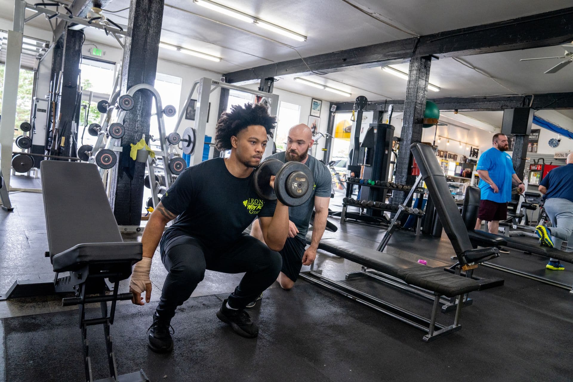 Member training at Iron Works Gym