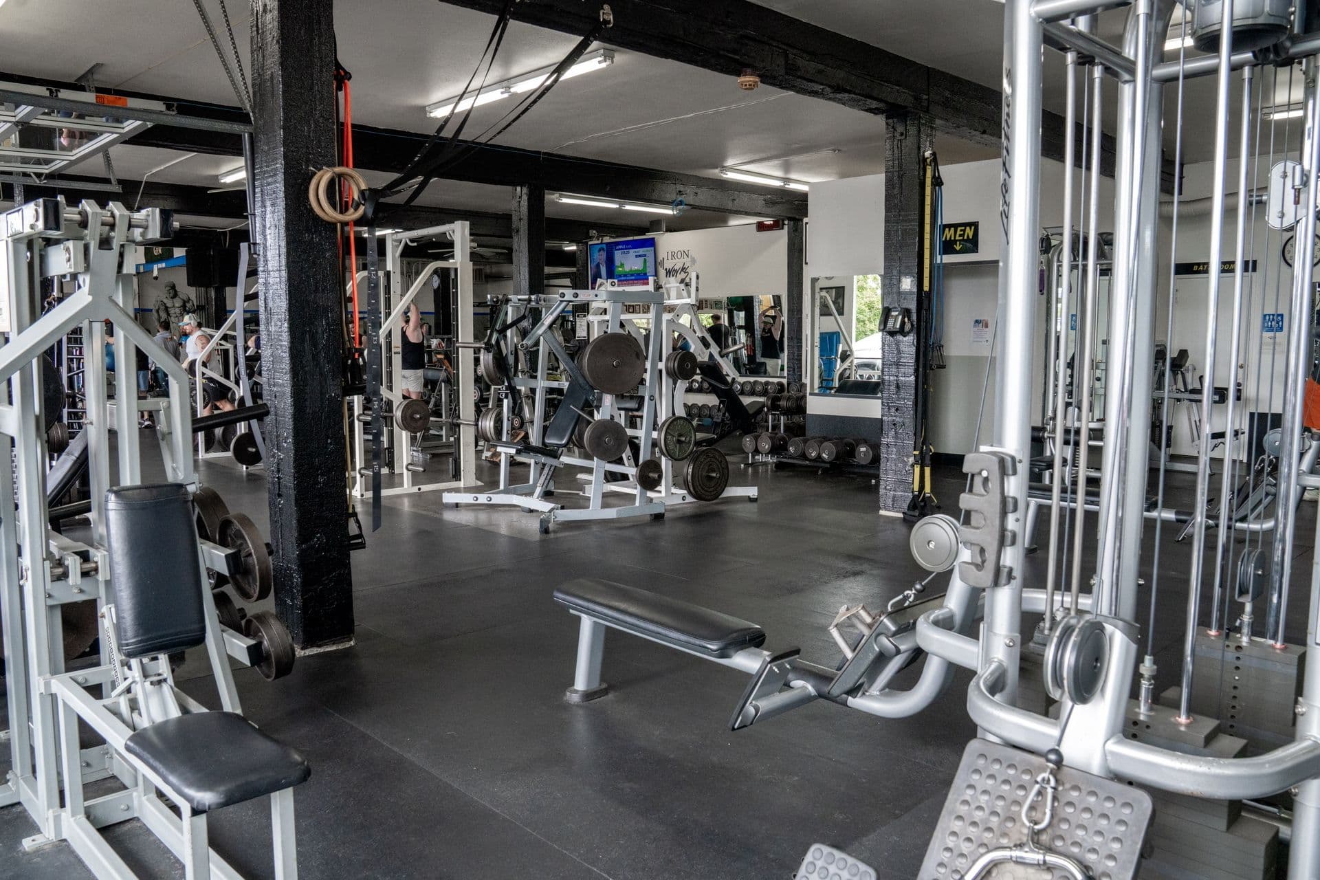 Wide view of the gym floor at Iron Works Gym